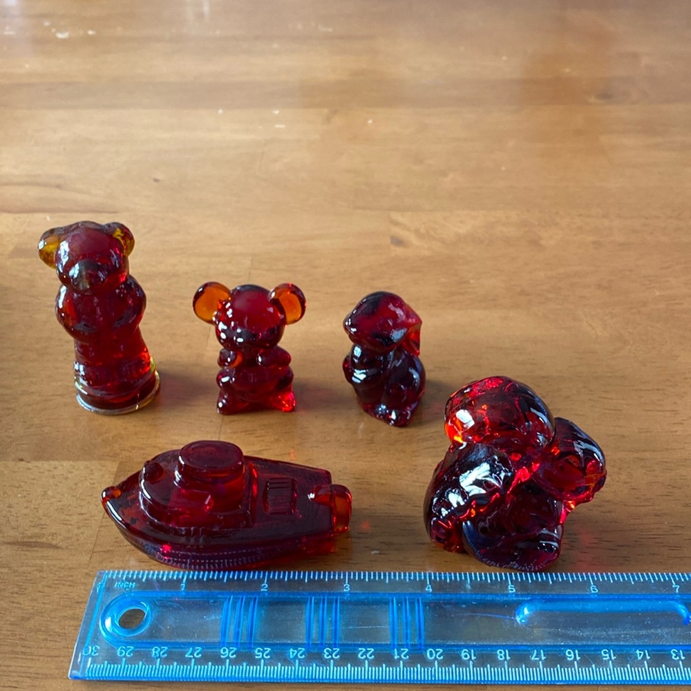 Red glass knickknacks. 5 Pieces, teddy, mouse, rabbit, squirrel and tugboat.